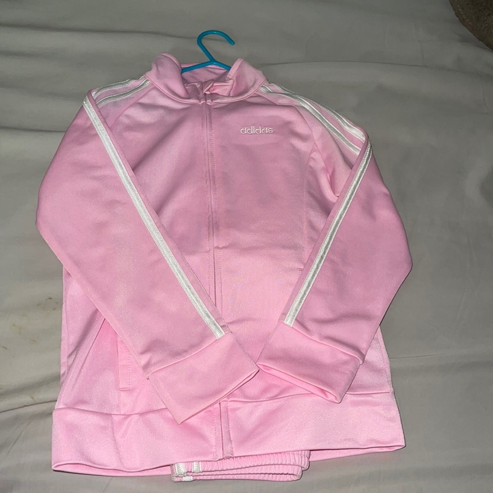 Adidas original track suite.